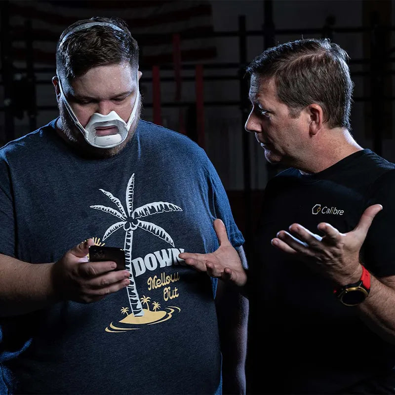 Breath Coach Sean Coakley explaining Calibre to a Male Athlete